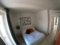 A bed or beds in a room at Casa UBARUNI