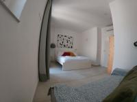 A bed or beds in a room at Casa UBARUNI