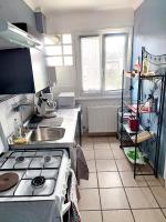 Kuchnia lub aneks kuchenny w obiekcie Bienvenue chez vous ! Malo (3mn de la plage)