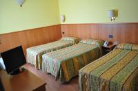 Posteľ alebo postele v izbe v ubytovaní Hotel Cinzia Ristorante Christian e Manuel