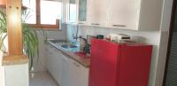 Kuchyň nebo kuchyňský kout v ubytování Studio Apartment Oliva
