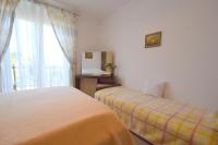 Łóżko lub łóżka w pokoju w obiekcie Apartment Potnar M