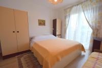 Łóżko lub łóżka w pokoju w obiekcie Apartment Potnar M