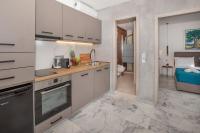 Kuchyňa alebo kuchynka v ubytovaní Iconic Athens Suites