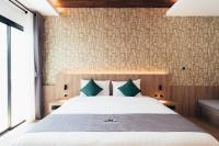 Poonsiri Varich Pool Villa Aonangにあるベッド