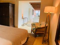 Postel nebo postele na pokoji v ubytování Hotel Masia La Palma