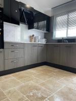 Kuchnia lub aneks kuchenny w obiekcie Loft atlantique Rochefort