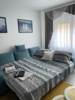 Postel nebo postele na pokoji v ubytování Studio Apartman Ante
