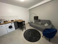 Kuchyňa alebo kuchynka v ubytovaní Les appartements d’Edgar