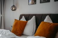 A bed or beds in a room at Kellerstöckl Huber in Eisenberg