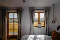 A bed or beds in a room at Kellerstöckl Huber in Eisenberg