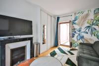 Televízia a/alebo spoločenská miestnosť v ubytovaní 21#Studio 2Pers#Sèvres-Lecourbe#Necker