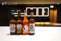 four bottles of beer sitting on a counter at Hotel Initial-Taichung in Taichung