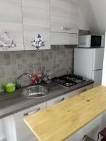 Kuchyňa alebo kuchynka v ubytovaní Casa vacanze su sorighe.