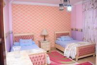 Postel nebo postele na pokoji v ubytování Kenzy guest house