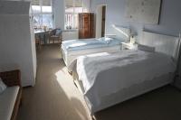 Postel nebo postele na pokoji v ubytování Hotel Alte Landschule