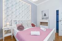 Posteľ alebo postele v izbe v ubytovaní Sweet Family Apartment Chodkiewicza Rondo Grzegórzeckie by Noclegi Renters