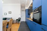 Kuchyňa alebo kuchynka v ubytovaní Sweet Family Apartment Chodkiewicza Rondo Grzegórzeckie by Noclegi Renters