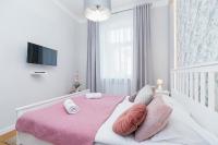 Posteľ alebo postele v izbe v ubytovaní Sweet Family Apartment Chodkiewicza Rondo Grzegórzeckie by Noclegi Renters