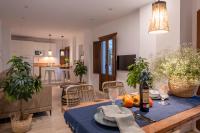 TV a/nebo společenská místnost v ubytování Suites Jardines de la Alhambra