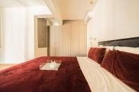Posteľ alebo postele v izbe v ubytovaní Sky Apartment