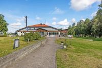 a building with a brick path in front of a building at Best Western Hotel Norra Vattern in Askersund