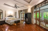 Postel nebo postele na pokoji v ubytování Centara Grand Beach Resort & Villas Hua Hin