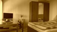 Posteľ alebo postele v izbe v ubytovaní Nefelejcs Apartman