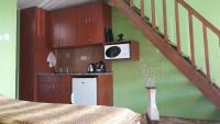 Kuchyňa alebo kuchynka v ubytovaní Nefelejcs Apartman