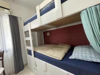 Postel nebo postele na pokoji v ubytování El Camino Hostel & Pub