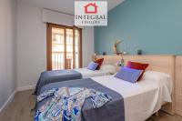 Posteľ alebo postele v izbe v ubytovaní Palamós Exclusive Apartments