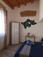 Postel nebo postele na pokoji v ubytování La Perla della Cattedrale luxury home