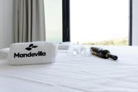 Postel nebo postele na pokoji v ubytování Mandevilla Hillside Luxury Villas