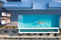 TV a/nebo společenská místnost v ubytování Mandevilla Hillside Luxury Villas