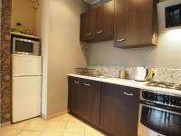 Kuchyňa alebo kuchynka v ubytovaní Gama K2124 Grand-Tourist Apartments