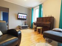Televízia a/alebo spoločenská miestnosť v ubytovaní Gama K2124 Grand-Tourist Apartments