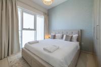 Postel nebo postele na pokoji v ubytování City View I 1 Bedroom Apartment I Golf Vita, Damac Hills