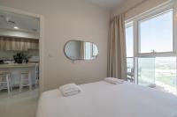Postel nebo postele na pokoji v ubytování City View I 1 Bedroom Apartment I Golf Vita, Damac Hills
