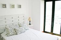 Posteľ alebo postele v izbe v ubytovaní Apartamento con vistas al mar 2