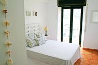 Posteľ alebo postele v izbe v ubytovaní Apartamento con vistas al mar 2