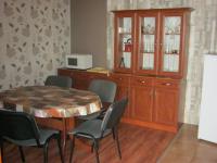 A kitchen or kitchenette at Kitti Apartman