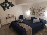 Postel nebo postele na pokoji v ubytování La Perla della Cattedrale luxury home