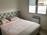 Łóżko lub łóżka w pokoju w obiekcie Joli appartement 50 m2 classé 3 etoiles avec terrasse et jardin