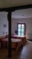 Postel nebo postele na pokoji v ubytování Corrala de San Antón. Sencillo apartamento en pleno centro