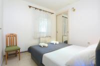 Posteľ alebo postele v izbe v ubytovaní Apartments and rooms with parking space Marina, Trogir - 5953