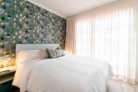 A bed or beds in a room at Morar Ourense