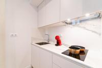 A kitchen or kitchenette at Morar Ourense