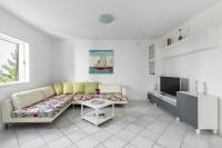 Televízia a/alebo spoločenská miestnosť v ubytovaní Apartments Croatia