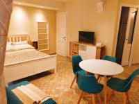 A bed or beds in a room at MancioBiba Home