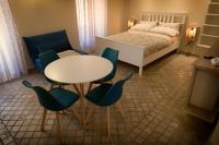 A bed or beds in a room at MancioBiba Home